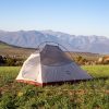 Naturehike Cloud Up 2-Person Ultralight Backpacking Tent set up in mountain terrain, ideal for lightweight backpacking, hiking, and outdoor adventures